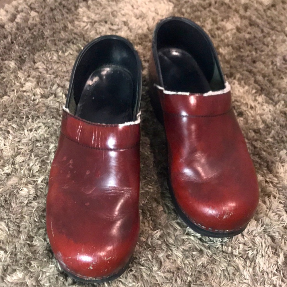 Dansko clogs signs of wear but plenty of life left.